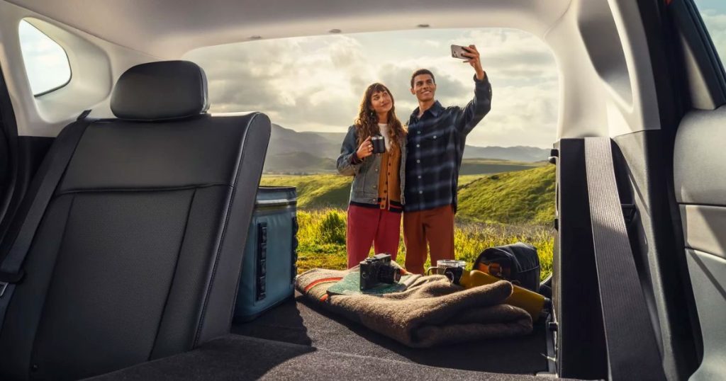 The 60/40 split fold-down rear design of the blue Hyundai Kona bumps the cargo space to 63.7 cubic feet.