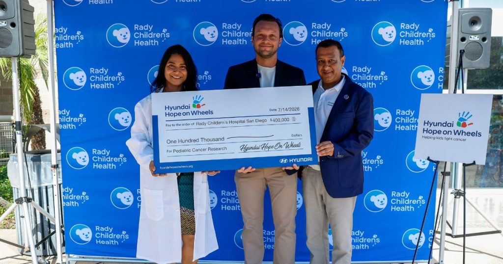 Dalton Hyundai CEO Juan Carlos presenting the Hope on Wheels grant to Rady Children's Hospital