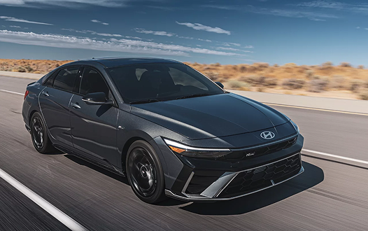 2026 Hyundai Elantra N Line in gray driving on desert highway