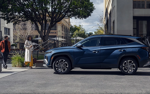 2026 Hyundai Tucson Hybrid parked on city street