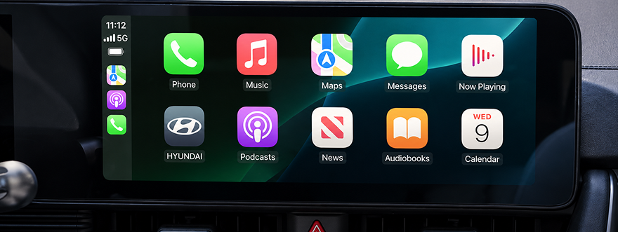 The IONIQ 5 touchscreen showing the Apple CarPlay app grid