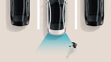 Overhead diagram of a white car backing out of a space with a sensor cone over a pedestrian behind it
