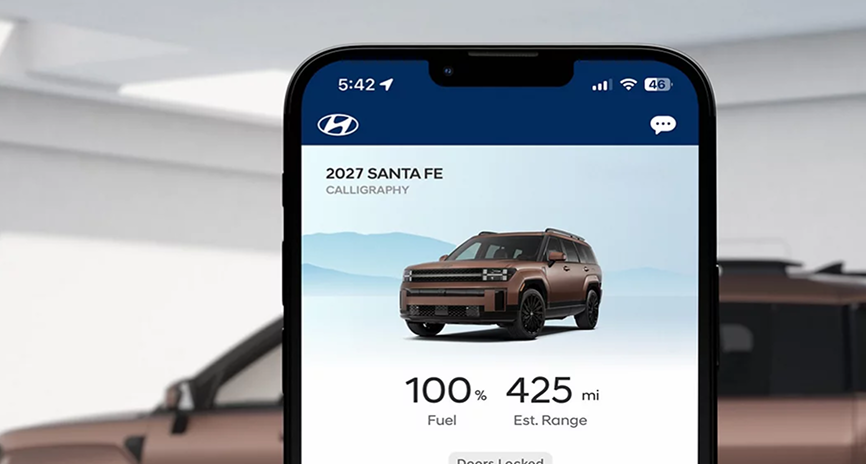 A smartphone showing the Bluelink app with fuel and range readouts for a 2027 SANTA FE
