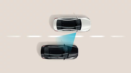 Overhead diagram of a white car sensing a vehicle in its rear blind spot