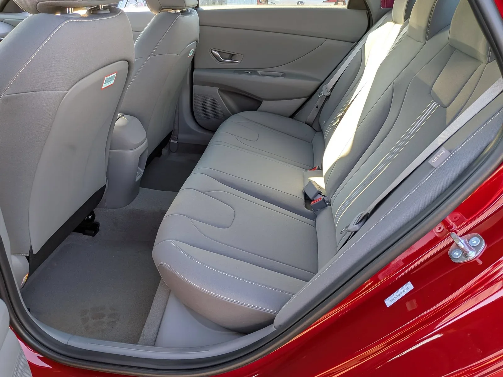 Rear seats of the red 2026 Hyundai Elantra