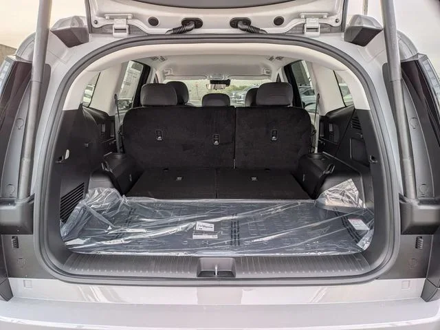 The IONIQ 9 cargo area behind the third row, seen through the open tailgate
